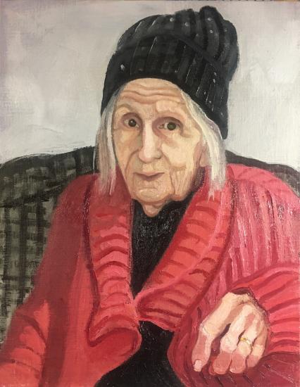 woman in hat and red sweater