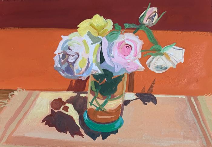flowers on table with orange background