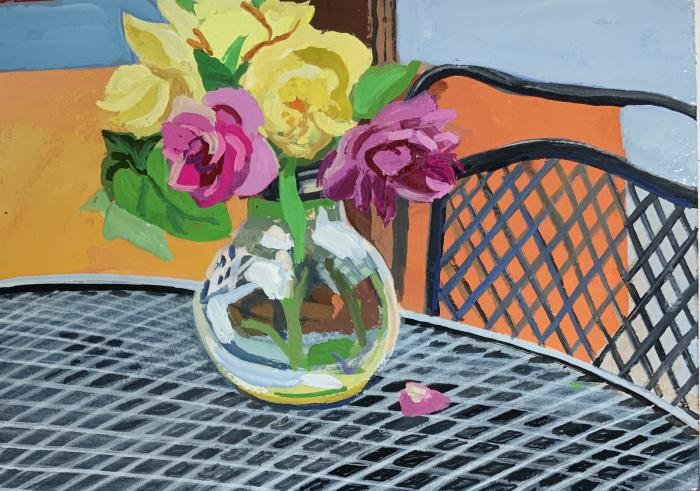 yellow and pink flowers in glass vase