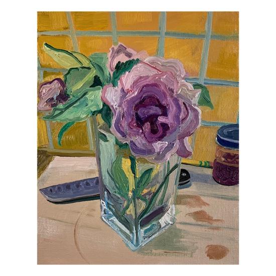 purple flower in vase