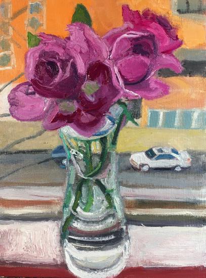 pink-purple flowers in glass vase